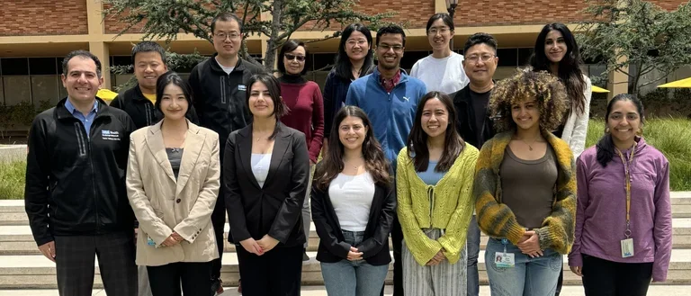 The lab group posing in the gardens of CHS