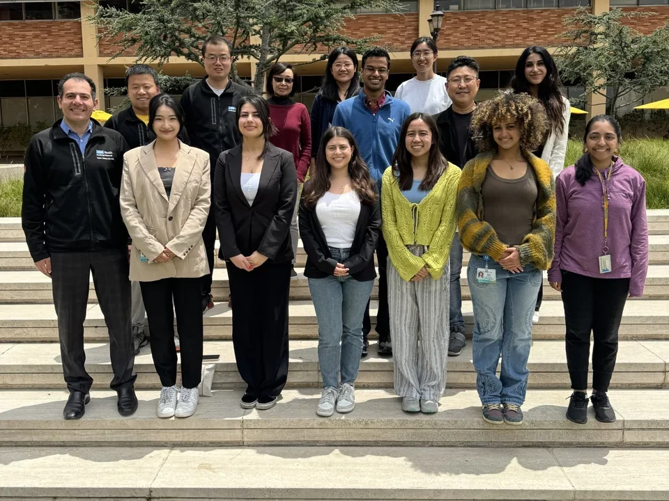 The lab group posing in the gardens of CHS