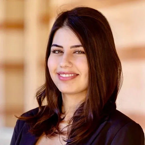 Ania Baghoomian standing outside in front of building