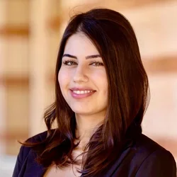 Ania Baghoomian standing outside in front of building